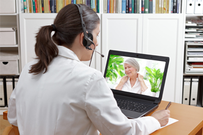 Physician consults woman via telehealth. (C) Adobe Stock. All rights reserved. 