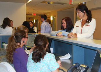 Sundberg and Pierce chat with nurses © UC Regents