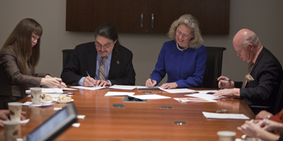 Signing agreement © UC Regents