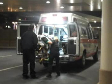Ambulance delivering person to emergency room © UC Regents