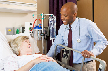 Physician greets patient in the hospital © iStockphoto