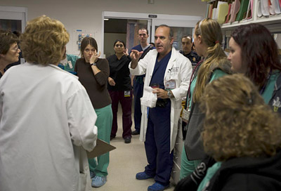 Dr. Kuppermann meets with emergency department team members © UC Regents