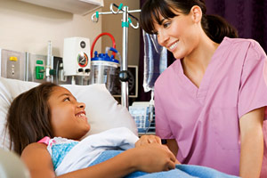 nurse with hospitalized girl