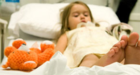 hospitalized girl with stuffed bear