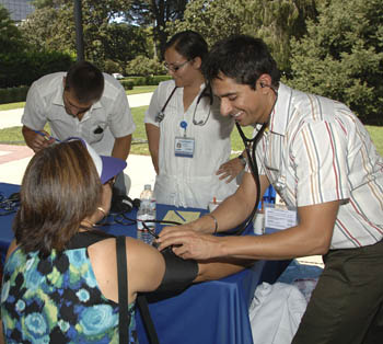 Medical students perform health screenings © UC Regents