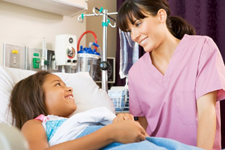 Nurse greets pediatric patient © iStockphoto