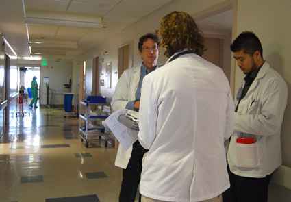 Dr. Kravitz on hospital rounds with medical students © UC Regents