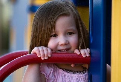 Girl playing on playground