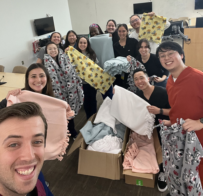 Nursing students sew blankets for hospitalized babies 