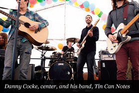 Danny Cocke, center, and his band, Tin Can Notes