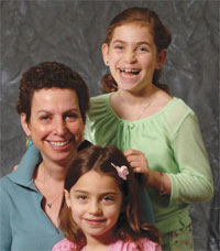 PHOTO — "If more people realized nonsmokers get this illness, perhaps there would be more support for research," says Mimi Arfin, shown with her daughters.