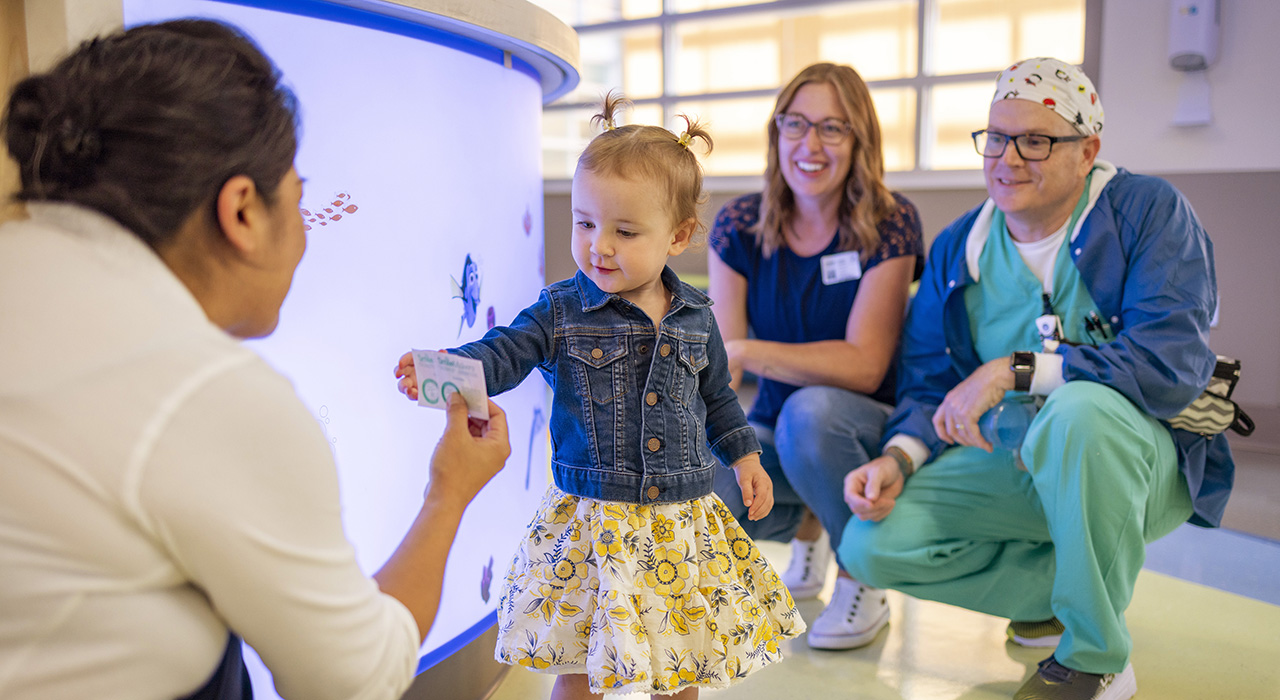 Pediatric surgery patient Ellie and her family in the Children’s Surgery Center