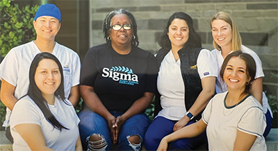 Tonja Copeland, center, says the School of Nursing was “looking at me more than just my grades” when she applied to the entrylevel nursing program.