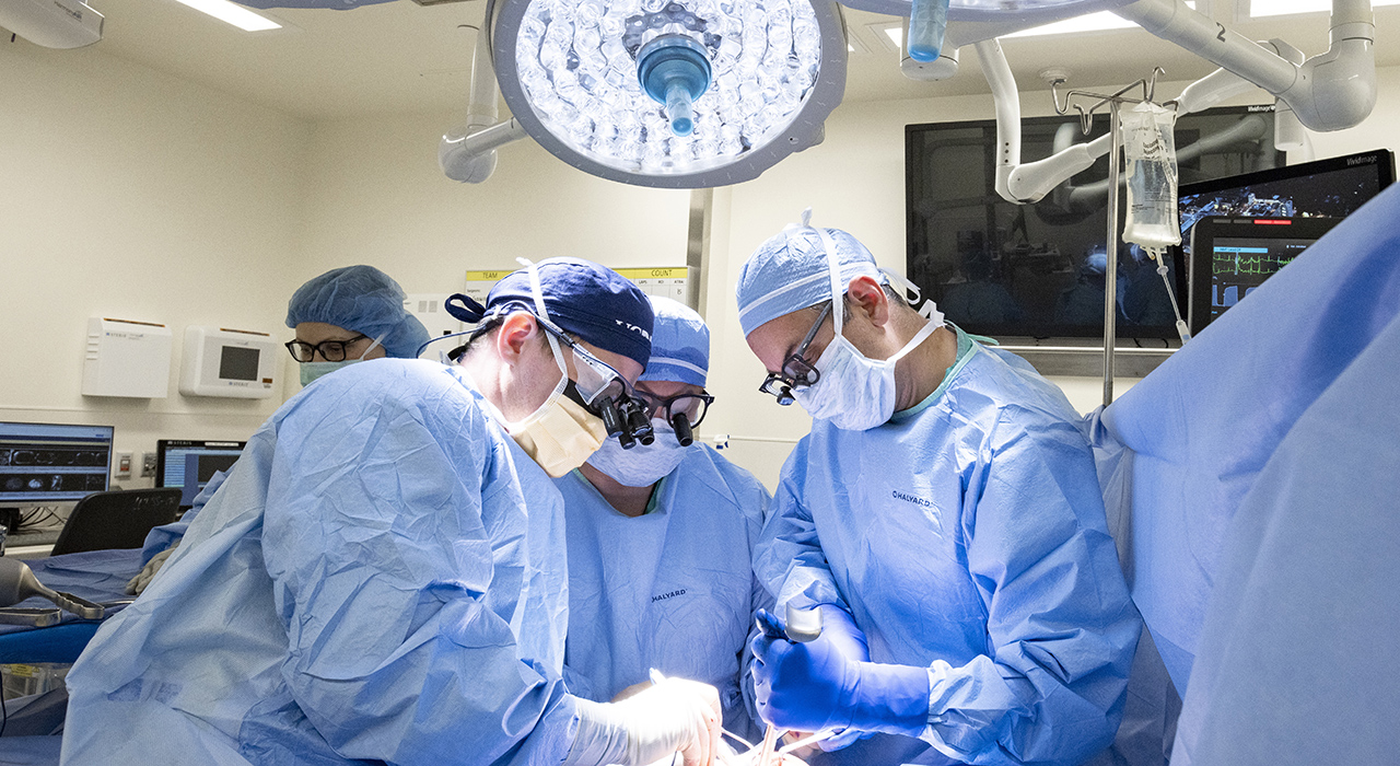 Surgeons during a liver transplant