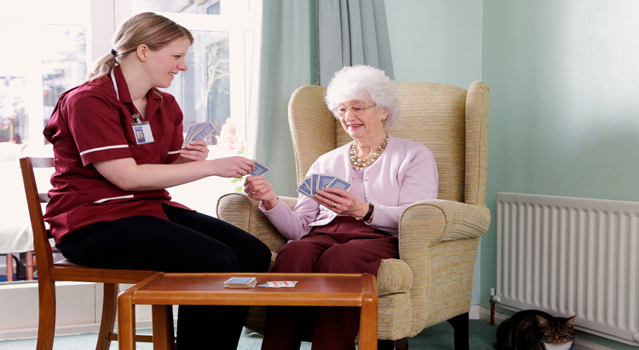 nurse and patient playing cards