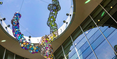 Steel and glass sculpture at UC Davis Health Medical Education Building